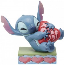 Figura enesco disney stitch abrazando un