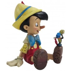 Figura enesco disney pinocchio sentado &